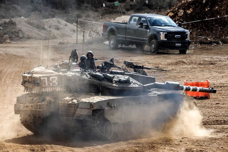 an israeli army main battle tank moves at a position along the border with lebanon in northern israel on october 1 2024 the israeli army on october 1 said it launched a ground offensive in lebanon and that its forces engaged in clashes further escalating the conflict after a week of intense air strikes that killed hundreds the un peacekeeping mission in lebanon said however the israeli operation did not amount to a ground incursion and while hezbollah denied any troops had crossed the border an israeli security official said localised raids had taken place and they were limited in scope photo afp