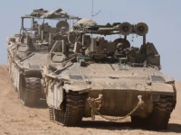israeli armoured personnel carriers apc manoeuvre near the israel gaza border amid the ongoing conflict between israel and the palestinian islamist group hamas in israel april 15 2024 photo reuters