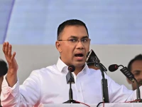 tarique rahman son of former prime minister khaleda zia and bangladesh nationalist party bnp s acting chairman addresses supporters during a rally after his arrival in dhaka on dec 25 2025 photo afp