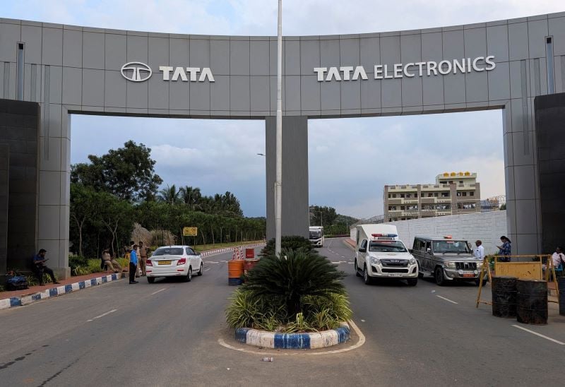 vehicles pass through the security check at the entrance of tata electronics plant in southern india which makes apple aapl o iphone component in hosur tamil nadu india september 28 2024 photo reuters