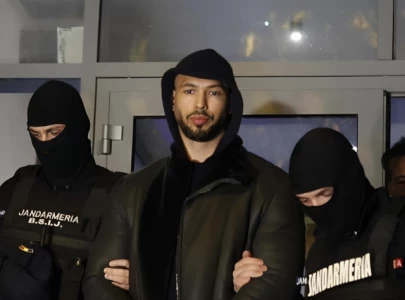 andrew tate home raided in romania for human trafficking