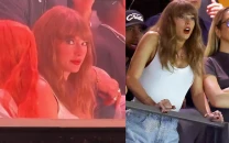taylor swift gives intense side eye as eagles fans boo her at super bowl 2025 taylor swift gives intense side eye as eagles fans boo her at super bowl 2025