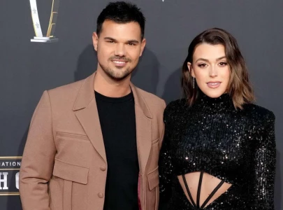 taylor lautner and wife tay announce pregnancy hint at baby name