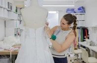 designer kat eberley works on a dress at the jenny yoo bridal boutique in new york city u s august 6 2026 photo reuters