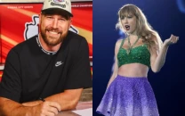 travis kelce spotted in florida as taylor swift skips amas