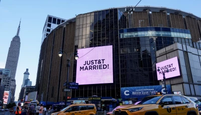 screens display a message referencing singer taylor swift and national football league nfl player travis kelce outside madison square garden the venue for their reported wedding celebrations in new york u s july 3 2026 reuters adam gray