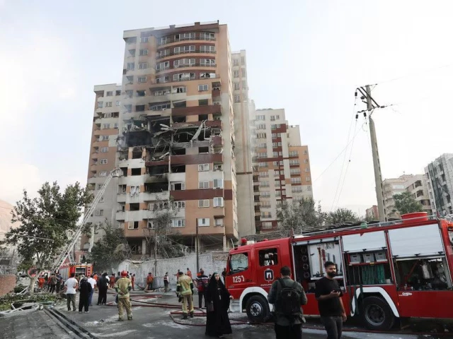 firefighters work at the scene of a damaged building in the aftermath of israeli strikes in tehran iran june 13 2025 photo reuters firefighters work at the scene of a damaged building in the aftermath of israeli strikes in tehran iran june 13 2025 photo reuters