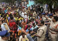 devotees gather to collect entrance tokens to visit the venkateswara swamy temple in tirupati district of india s andhra pradesh jan 8 2025 photo afp