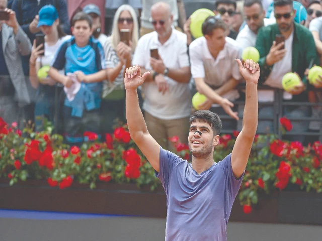 carlos alcaraz celebrates after victory against serbia s dusan lajovic for the atp rome open tennis tournament at foro italico in rome on may 9 photo afp carlos alcaraz celebrates after victory against serbia s dusan lajovic for the atp rome open tennis tournament at foro italico in rome on may 9 photo afp