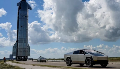 tesla cyber trucks lead the way as the spacex starship spacecraft rolls out toward the launch pad before its 11th test flight from the company s complex in starbase texas us october 11 2025 photo reuters
