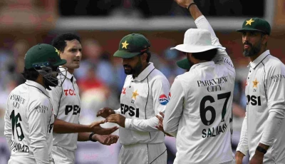 pakistan s muhammad abbas 2l celebrates with teammates after taking the wicket of england s dan lawrence on day four of the second test match between england and pakistan at lord s cricket ground in london on august 30 2026 photo afp