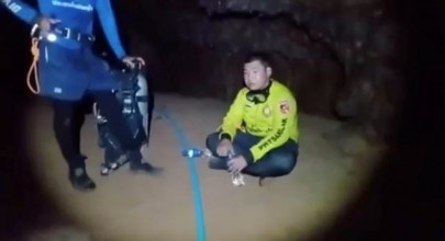 thai rescue unit frees buddhist monk trapped in flooded cave