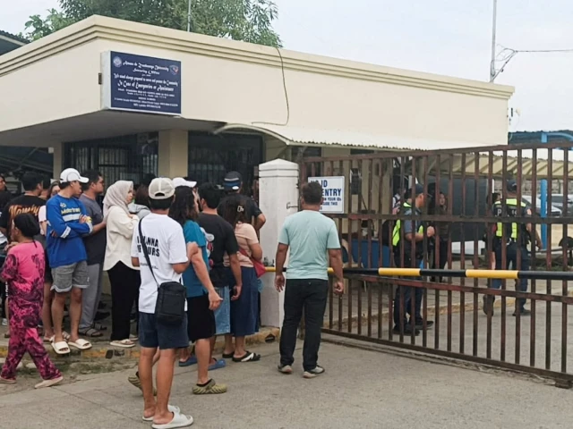 people stand outside ateneo de zamboanga university after a shooting that killed two people in zamboanga southern philippines august 18 2026 photo reuters people stand outside ateneo de zamboanga university after a shooting that killed two people in zamboanga southern philippines august 18 2026 photo reuters