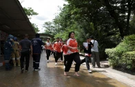 students without wearing shoes run as they evacuate from debsirin nonthaburi school the site of a shooting incident in bang kruai district in nonthaburi province on the outskirts of bangkok thailand august 7 2026 photo reuters