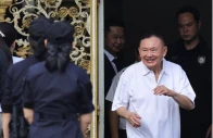 former thai prime minister thaksin shinawatra reacts following his release on parole after serving eight months of his one year sentence at klong prem central prison in bangkok thailand may 11 2026 photo reuters