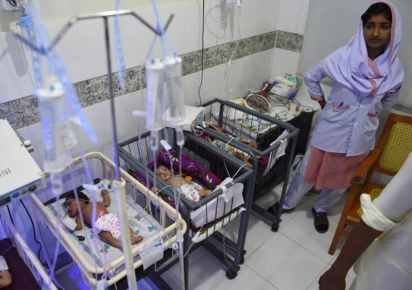 a medic takes care of children at mithi civil hospital in mithi photo afp