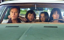 the end of oak street anne hathaway s dinosaur thriller gets first trailer the end of oak street anne hathaway s dinosaur thriller gets first trailer