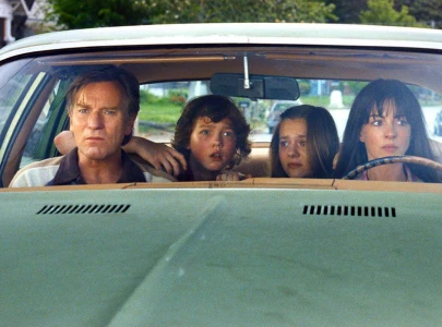 the end of oak street anne hathaway s dinosaur thriller gets first trailer