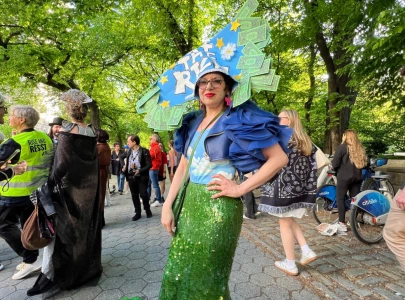 workers stage ball without billionaires to protest bezos ahead of met gala