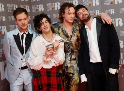 the 1975 matty healy face 2 million lawsuit for same sex kiss lgbtq protest at malaysian festival