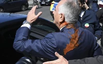 red liquid thrown at iranian opposition figure reza pahlavi during germany visit