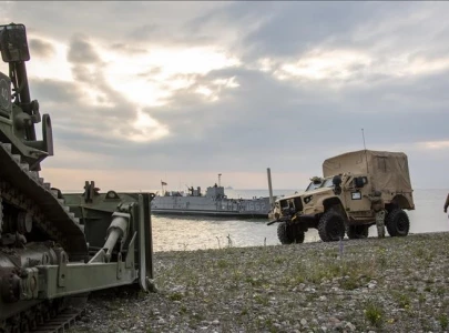 russia cautions nato over escalating military presence on its borders