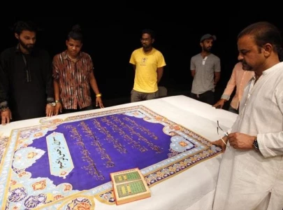 world s largest copy of holy quran being prepared in pakistan
