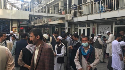 afghanistan s biggest currency exchange market reopens after taliban takeover