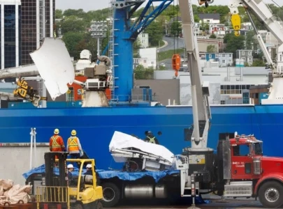 presumed human remains and shattered titanic submersible returned to shore presumed human remains and shattered titanic submersible returned to shore