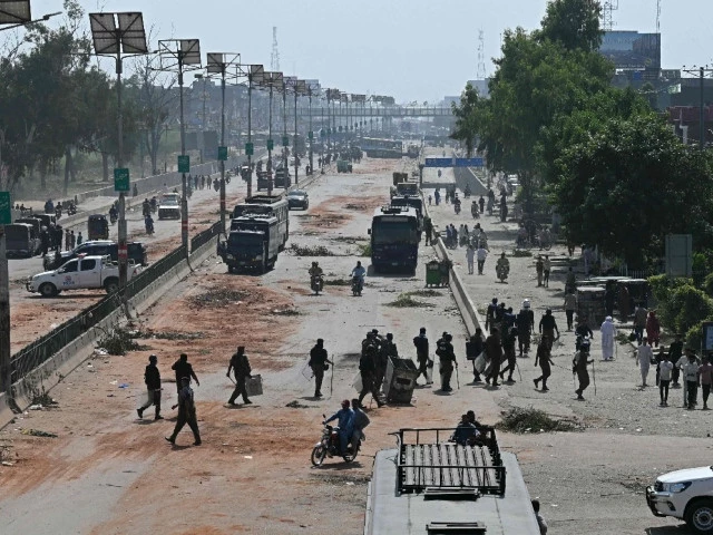 police personnel patrol a street following crackdown on tlp party activists during an anti israel protest in muridke on october 13 photo afp police personnel patrol a street following crackdown on tlp party activists during an anti israel protest in muridke on october 13 photo afp
