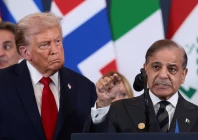 us president donald trump looks at prime minister shehbaz sharif speaking following the official signing of the first phase of the gaza ceasefire agreement in sharm el sheikh egypt on october 13 2025 photo reuters