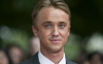 tom felton reveals favourite harry potter film and reflects on draco malfoy role