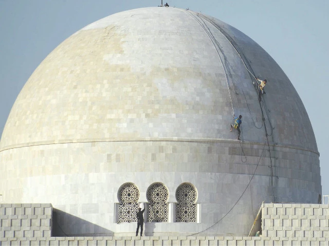 the iconic white dome of mazar e quaid begins its journey back to brilliance decades of wear erased by skilled hands as malagori marble is being polished and cracks mended to honour the father of the nation this december photo ppi