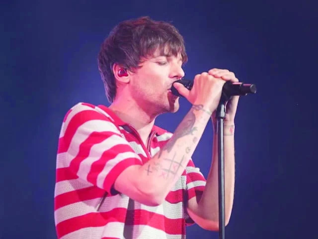 tomlinson and fellow band members niall horan liam payne harry styles and zayn malik were guarded by preston mahon during the group s frenzied touring years photo agencies