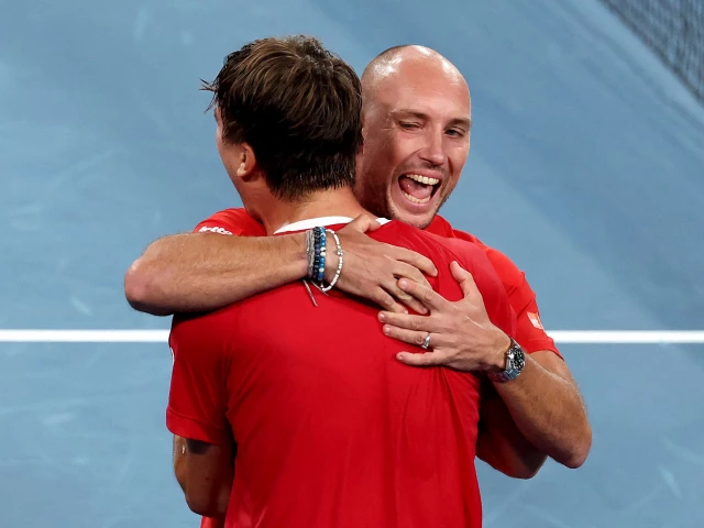 belgium s raphael collignon l celebrates with team captain steve darcis after defeating australia s alek vukic during the davis cup second round qualifier photo afp belgium s raphael collignon l celebrates with team captain steve darcis after defeating australia s alek vukic during the davis cup second round qualifier photo afp