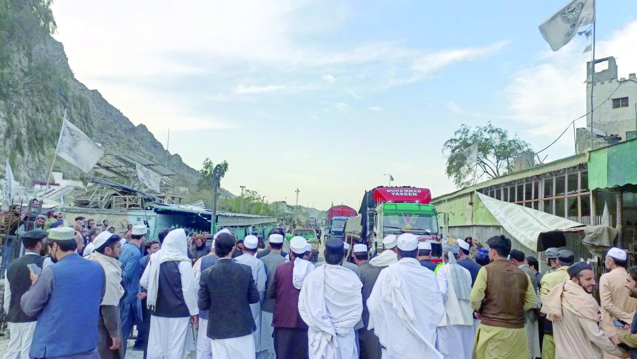 cargo trucks roll through the vital torkham trade corridor on wednesday as movement to and from afghanistan after a 26 day closure photo express