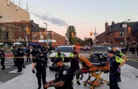 police officers stand guard as emergency workers respond at the site of a deadly shooting at a salsa themed street festival in toronto ontario canada july 11 2026 photo reuters