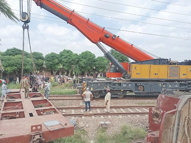a relief train clears the track in okara where two freight trains collided on thursday photo nni