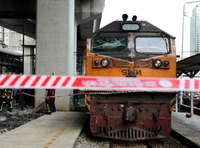at least eight dead 25 injured in train collision that sparks bus fire in thailand