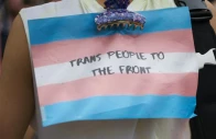 a activist showing transgender flag photo pixabay