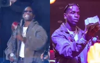 travis scott draws controversy after smoking joint during wwe s netflix debut with jey uso entrance