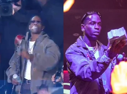 travis scott draws controversy after smoking joint during wwe s netflix debut with jey uso entrance