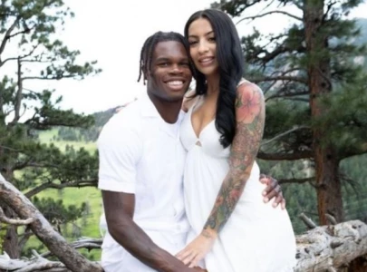 travis hunter girlfriend controversy escalates as social media backlash forces couple offline