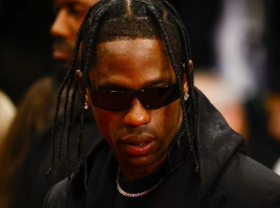 travis scott debuts boston celtics inspired jordan jumpman jack shoes courtside at nba finals travis scott debuts boston celtics inspired jordan jumpman jack shoes courtside at nba finals