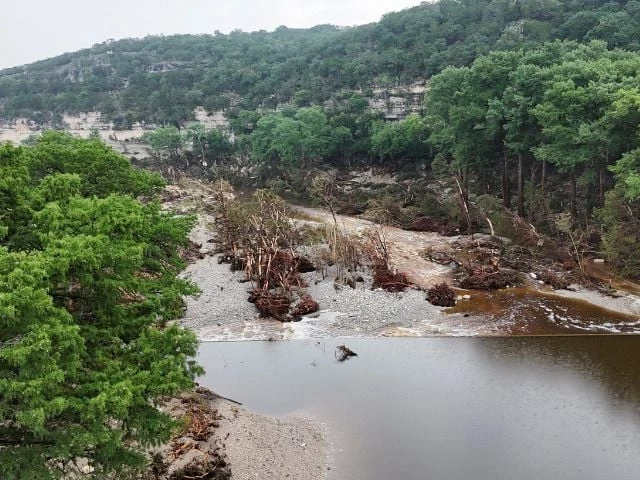 a drone view shows the guadalupe river and damage from flooding near camp mystic in hunt texas u s july 6 2025 reuters evan garcia a drone view shows the guadalupe river and damage from flooding near camp mystic in hunt texas u s july 6 2025 reuters evan garcia