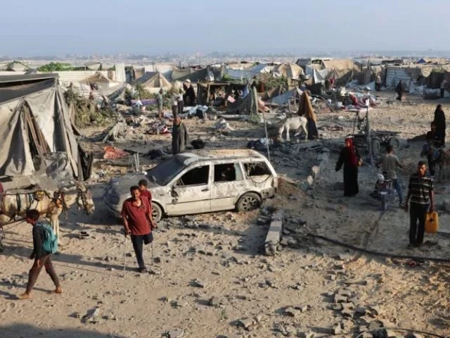 palestinians stand near a damaged vehicle at the site of an overnight israeli air strike on a house in khan younis in the southern gaza strip july 28 2025 ramadan abed reuters palestinians stand near a damaged vehicle at the site of an overnight israeli air strike on a house in khan younis in the southern gaza strip july 28 2025 ramadan abed reuters