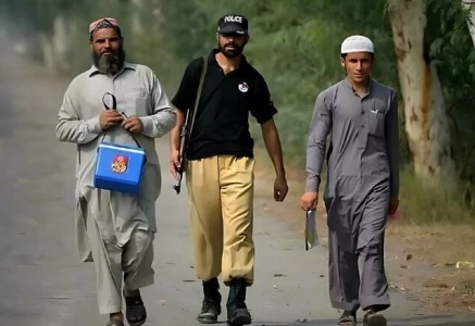 police officer martyred four injured in attack on polio team in k p