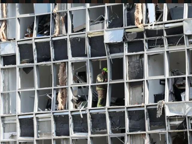 a rescuer stands inside a damaged building following a strike from iran on israel in ramat gan israel on june 19 nir elias reuters a rescuer stands inside a damaged building following a strike from iran on israel in ramat gan israel on june 19 nir elias reuters