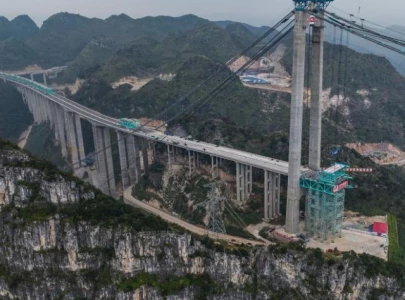 china to open world s tallest bridge rising 2 051 feet above canyon china to open world s tallest bridge rising 2 051 feet above canyon