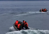 rescue team members use rubber boats during a search operation for missing passengers in simalungun north sumatra indonesia photo reuters